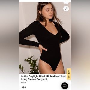 Lulu’s black ribbed. V-neck body suit